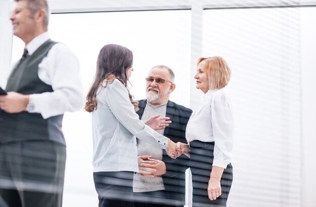 Business people shaking hands when meeting in the office