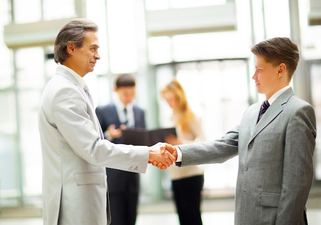 Business people shaking hands, 