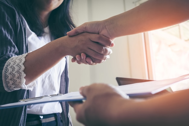 Business people shaking hands