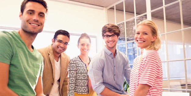 Business people smiling at camera