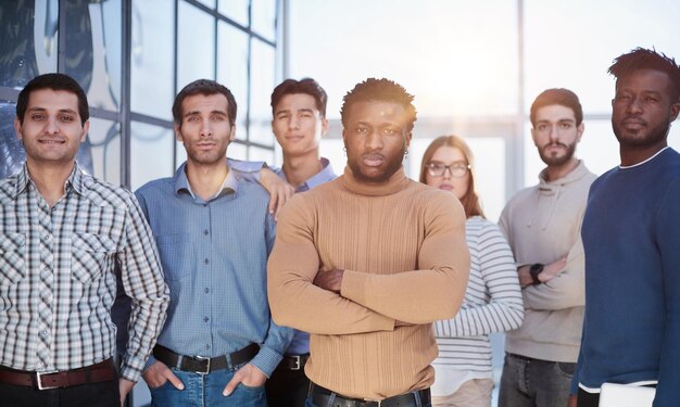 Photo business people standing at a meeting in a conference room