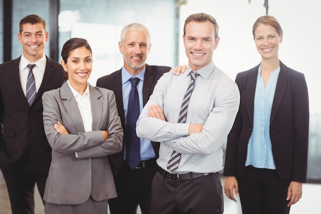 business people standing with arms crossed