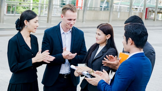 Business people talking about documents