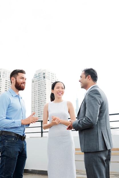 Business people talking outdoors