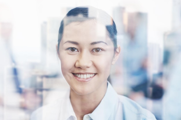 business, people and teamwork concept - smiling businesswoman with group of businesspeople meeting in office