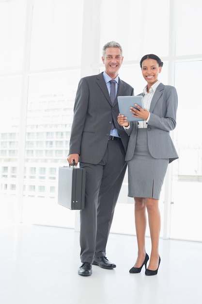 Business people using tablet computer 