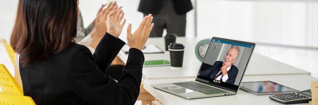 Photo business people in video call meeting proficiently discuss business plan
