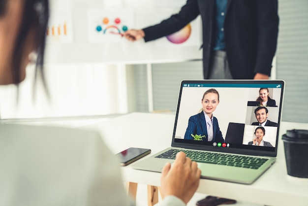 Business people in video call meeting proficiently discuss business plan