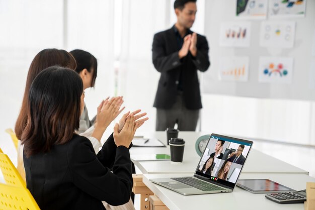 Business people in video call meeting proficiently discuss business plan