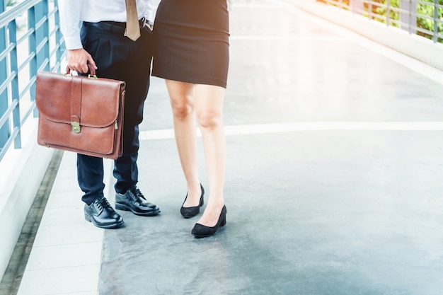 Business people walking  outside office