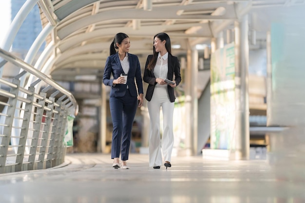 Business people walking and talk to each other