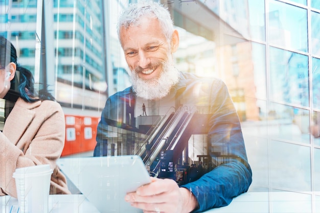 Business people watch something on a smartphone