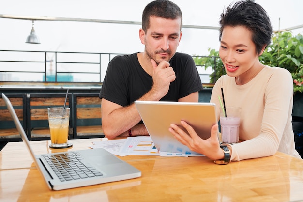 Business people watching online presentation