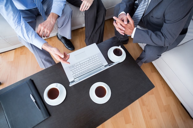 Business people with laptop and diary