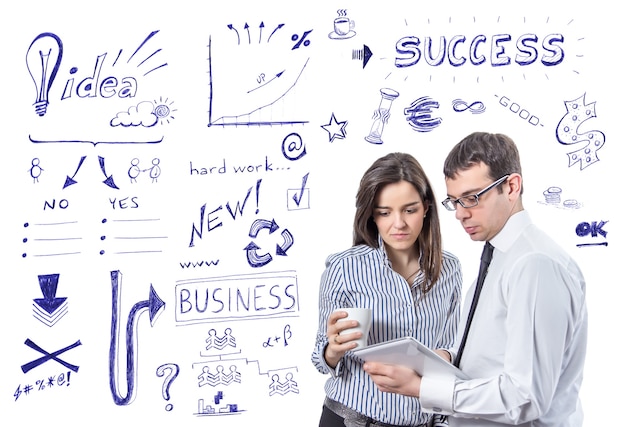 Business people with tablet over success symbols