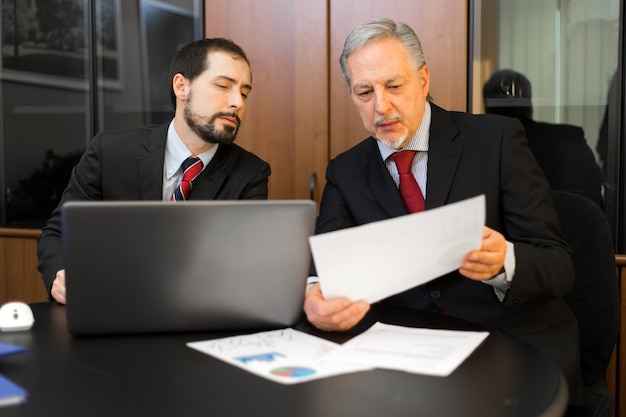 Business people at work in their office