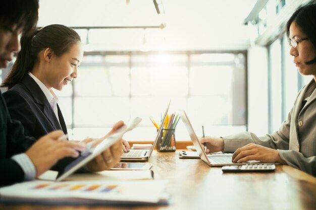 Business people working at desk in office