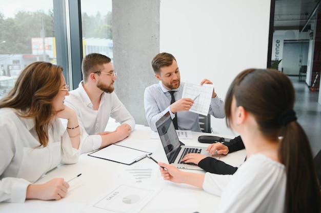 Business people working on project in office