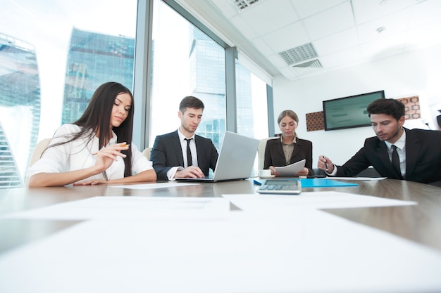 Business people working together at a meeting in modern office