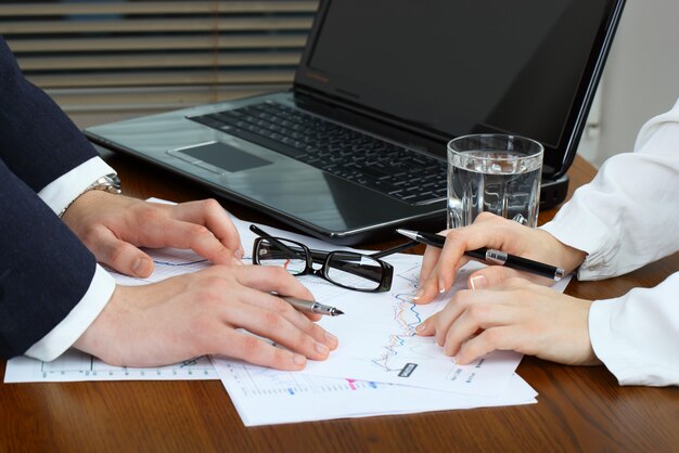 Business people working with business documents in the office.