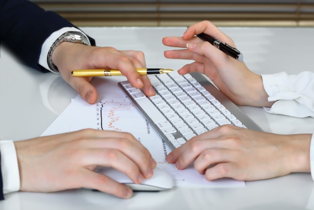 Business people working with business documents in the office.