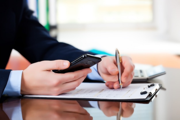 Business people working with business documents in the office.