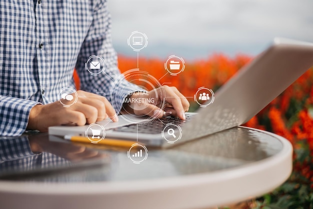 Business people working in the work area with laptop and tablet at the desk business concepts area outdoor