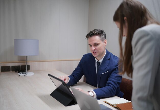 Business people in the workplace are discussing a working
strategy for doing business