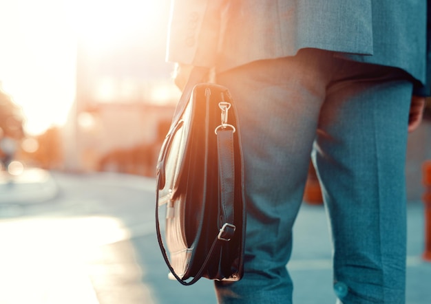 Business person holding a briefcase