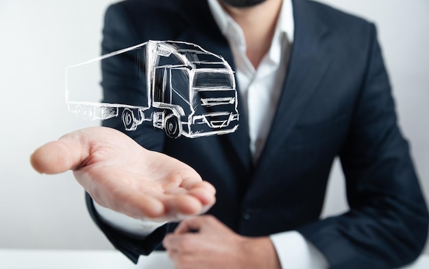 Business person holding a truck icon