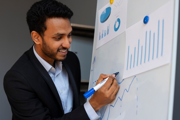 Photo business person looking at finance graphs