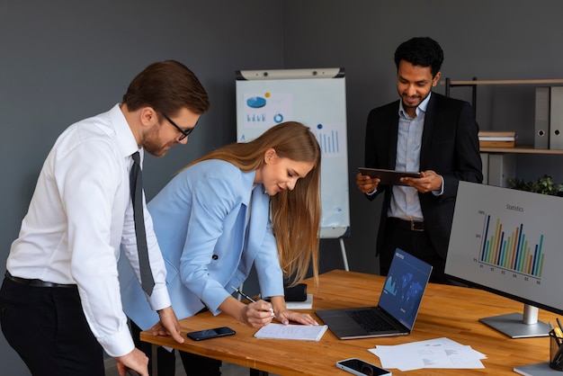 Photo business person looking at finance graphs