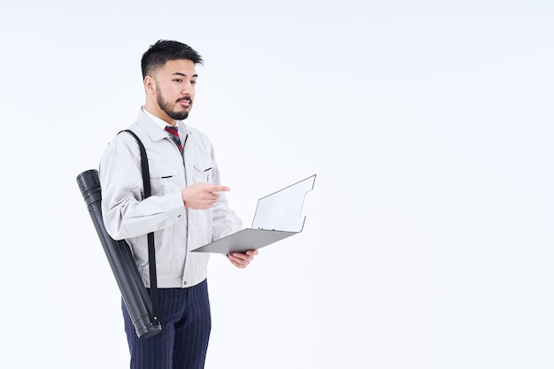 Business person in work clothes confirming pointing