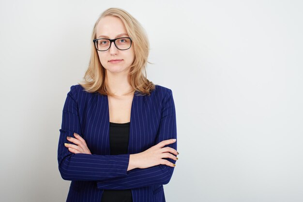 Business portrait of a girl blonde on white background