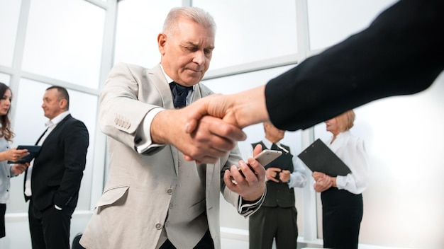 Business shaking hands before the talks the concept of cooperation