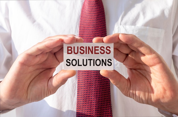 Business solutions text. Concept of consulting and solving problems.