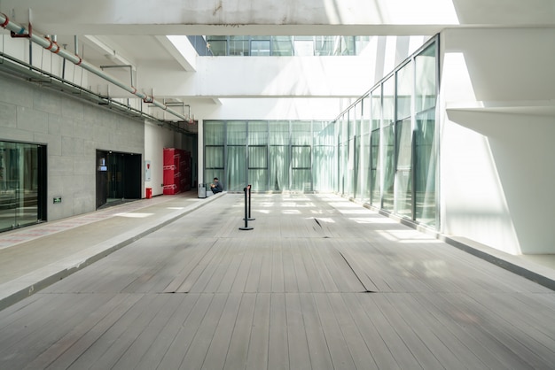 Business space with glass windows and concrete floor