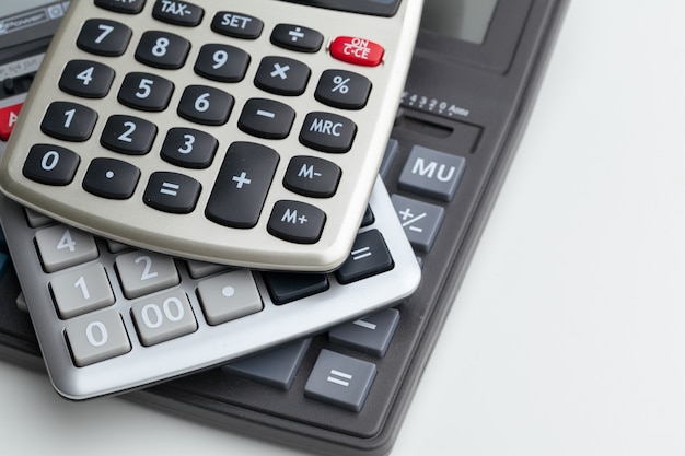 Business still life with calculator on table in office.