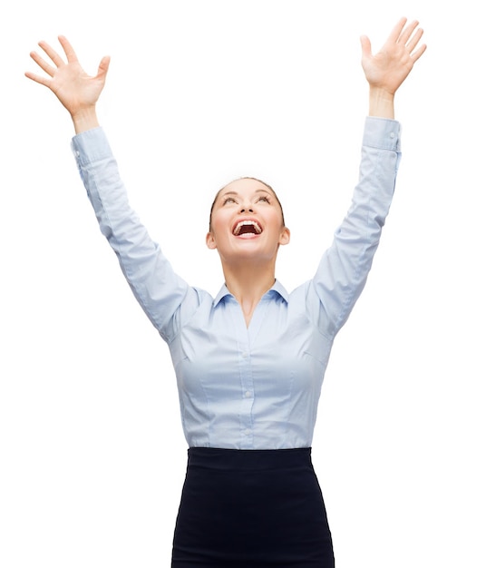 business, success and office concept - laughing businesswoman waving hands