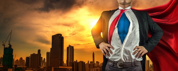 Business superhero man on the city