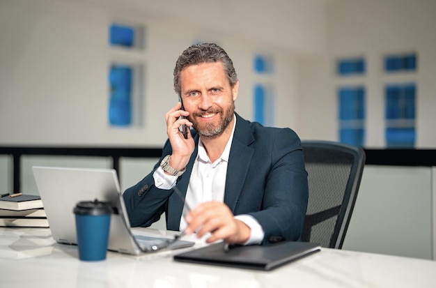business talk on phone employee remote working in modern office business man on online meeting