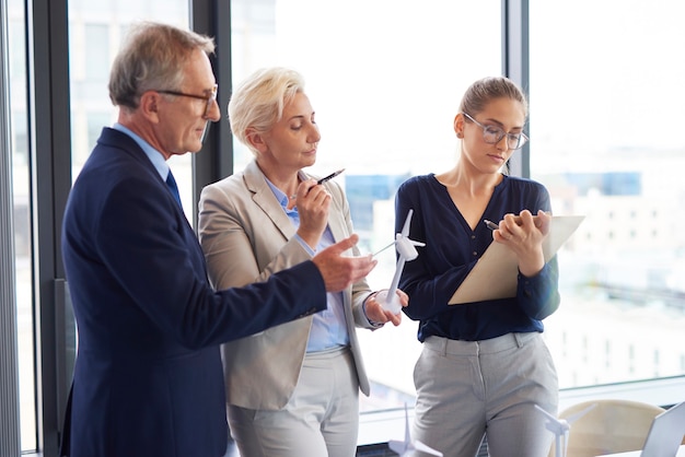 Business talks about renewable energy in the office