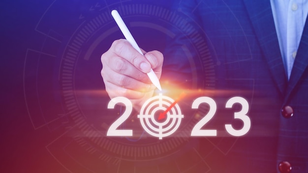비즈니스 목표 및 목표 2023 아이콘 손을 가리키는 2023 가상 화면 2023년 목표 계획 실행 계획 전략 새해 비즈니스 비전으로 새해 시작