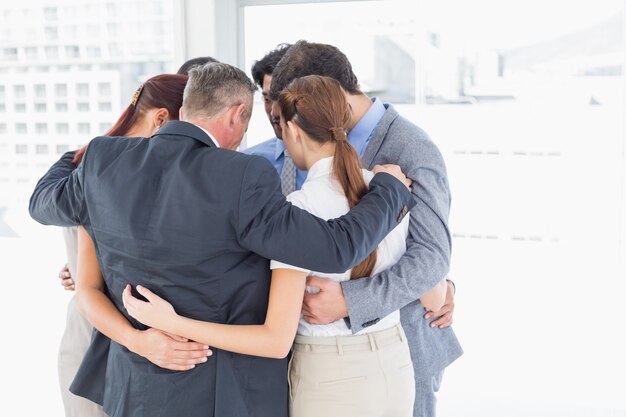 Business team all huddled together