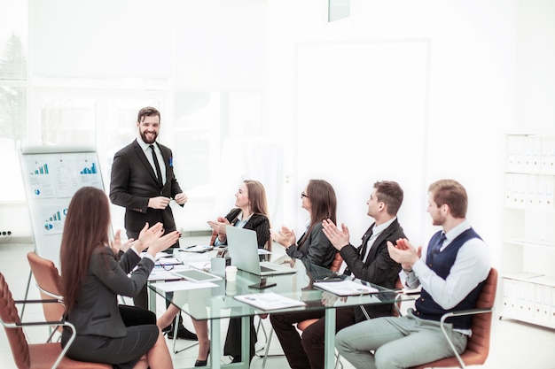 business team applauding the Manager  on the presentation of the new project