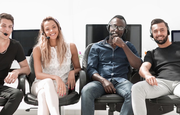 Business team call center sitting in front of the Desk