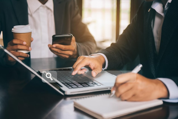 Business team clicking internet search page on computer touch screen in office