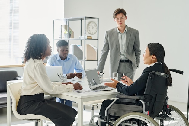 Business team cooperating at meeting