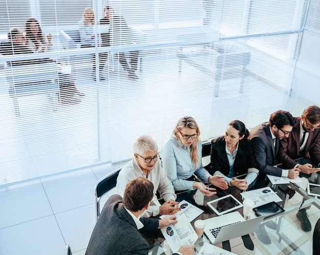 Business team discussing financial data at an office meeting