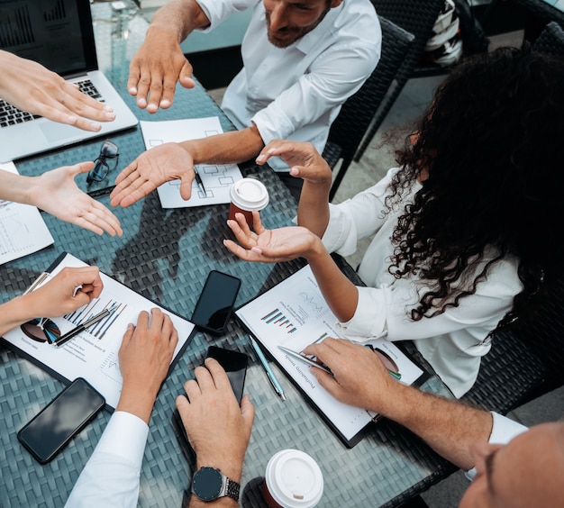 Business team discussing financial growth  close up